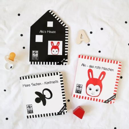Livre contrasté "Aki's House" | Rouge et noir pour bébé 2 mois+ | Montessori tummy time | lesminis.fr