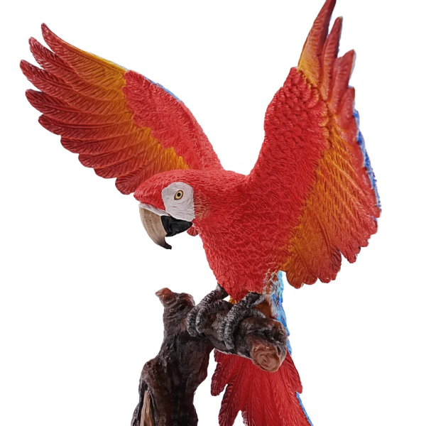 Figurine ara rouge ailes déployées sur sa branche ToyMany