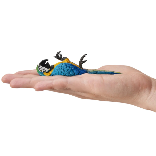 Figurine ara bleu et jaune couché sur le dos ToyMany