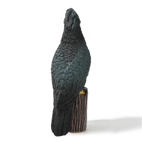 Figurine cacatoès noir (microglosse) sur sa souche