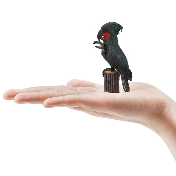 Figurine cacatoès noir (microglosse) sur sa souche